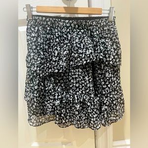 Stradivarius frill mini skirt in black ditsy floral Size Small